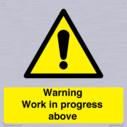 gender-neutral-construction-warning-sign-warning-work-in-progress-above-with-exc~